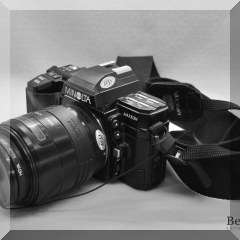 E29. Minolta 700 Film camera - $90